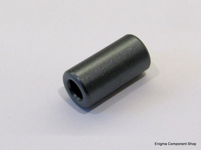 Small Ferrite Core for Power Supply Decoupling showcasing the core and windings, ideal for reducing RF interference in power supply lines.