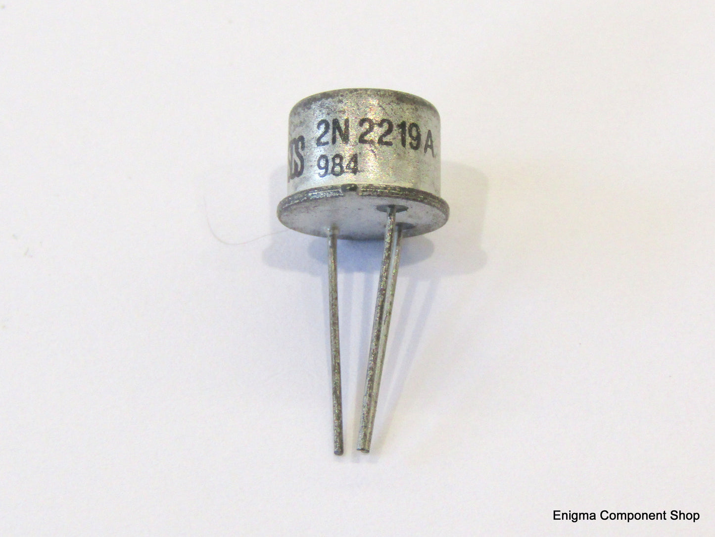 High frequency NPN transistor 2N2219A by SGS Thompson, used in RF amplifiers and oscillators, rated at 40V, 0.6A, with a transition frequency of 300MHz, presented in a TO-39 metal package.